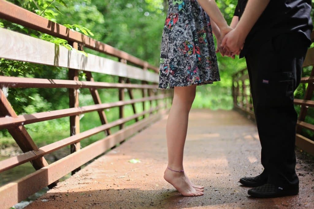 adult barefoot blur bridge 618916 1024x682